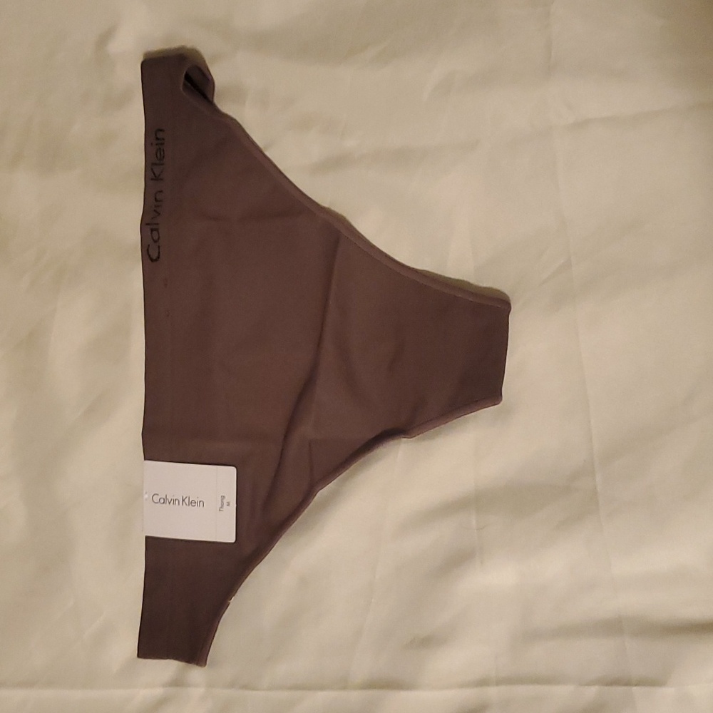 Calvin Klein Women's Pure Seamless Thong in Brown Size Medium NWT